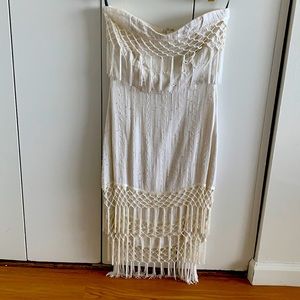 Strapless white dress with fringe details